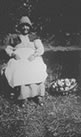 Mrs. Sylvia Stark (aged 92) with apples from her orchard, Saltspring Island