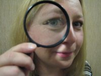 Woman with magnifying glass